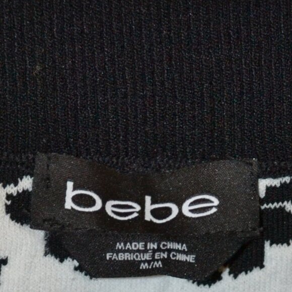 " BEBE " BLACK AND WHITE FLEXIBLE SKIRT SIZE M - Picture 4 of 7